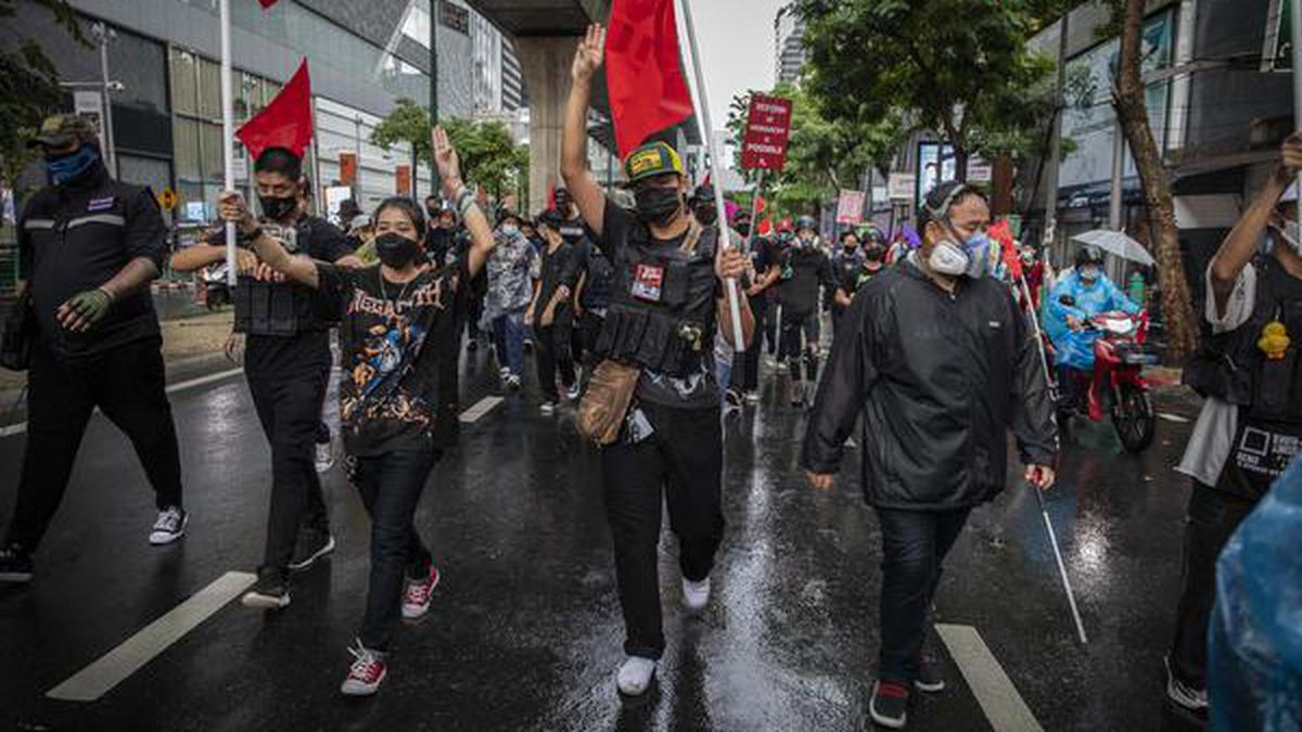 Thai protesters hit the streets as PM wins no-confidence vote