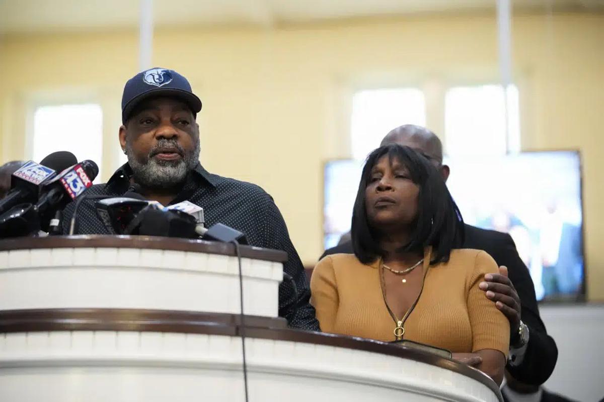 Rodney Wells, stepfather of Tyre Nichols, speaks at a news conference with civil rights Attorney Ben Crump, seen comforting Tyre’s mother RowVaughn Wells. (AP Photo)