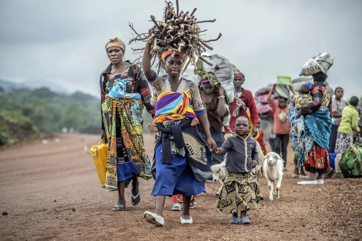 File photo: Residents flee fighting between M23 rebels and Congolese forces near Kibumba, some 20 kms North of Goma, Democratic Republic of Congo, in October 2022.