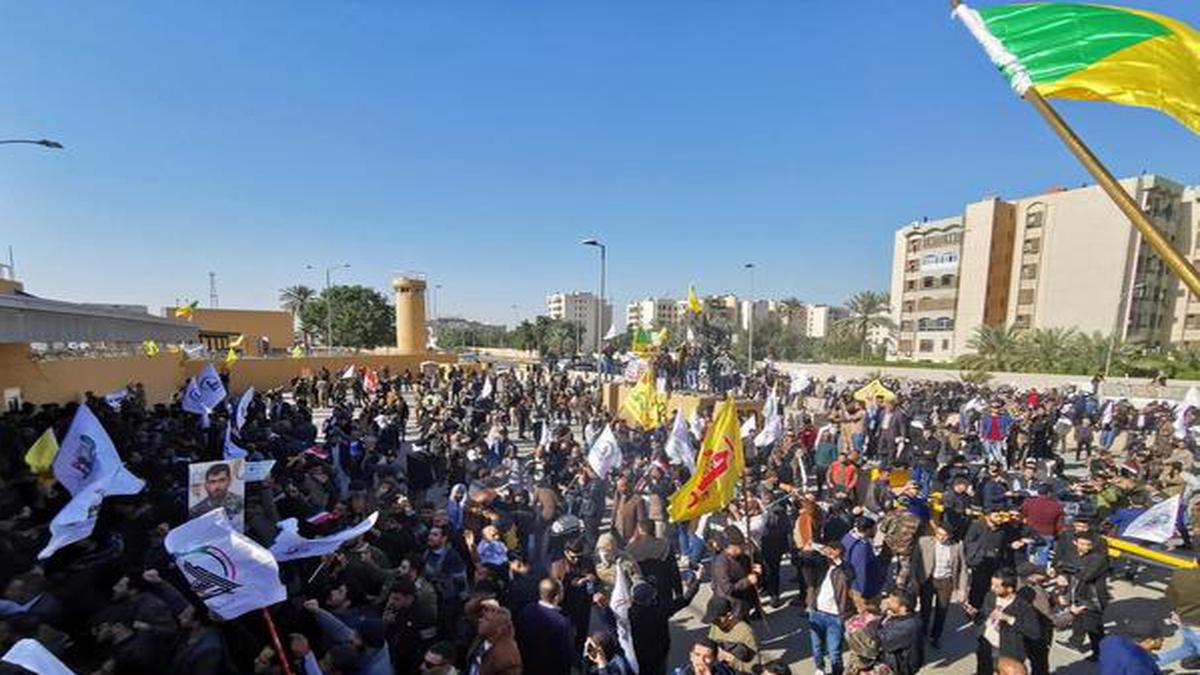 Protesters try to break into U.S. Embassy in Baghdad after air strikes