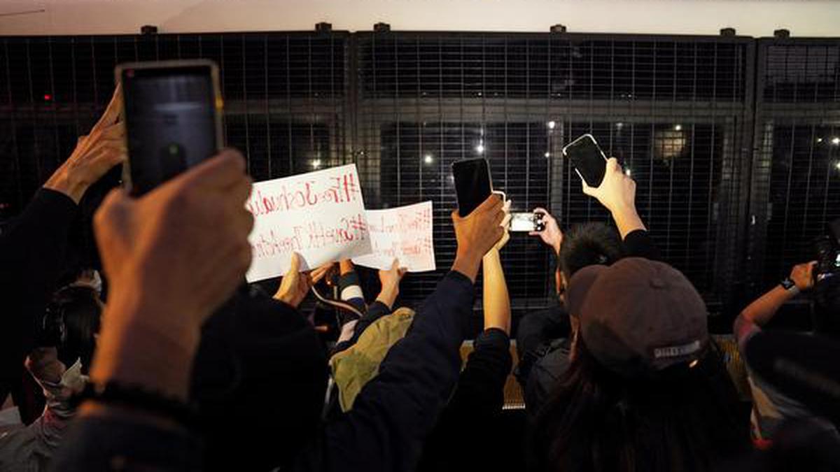 Hong Kong activist Joshua Wong defiant as he is jailed over 13 months for protest