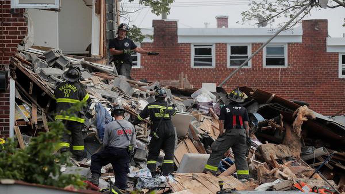 1 dead, 7 rescued after natural gas explosion destroys row houses in ...