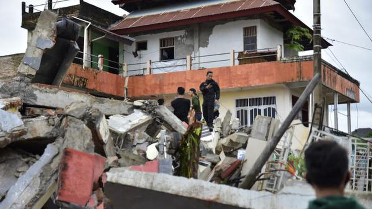 At least 42 dead as Indonesia quake topples homes, buildings