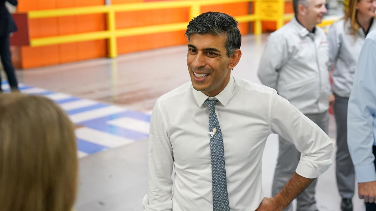 British PM Rishi Sunak gets small bump in opinion polls after crowd-pleasing tax cuts