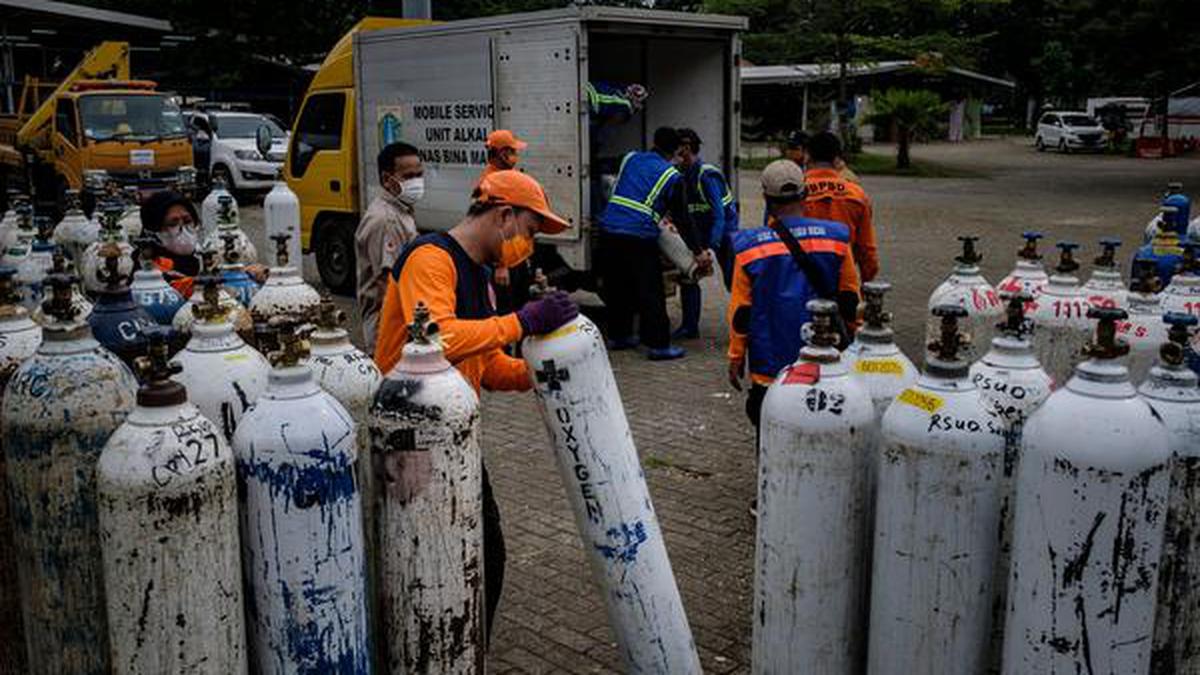 Indonesia reports record COVID-19 cases, orders oxygen supplies