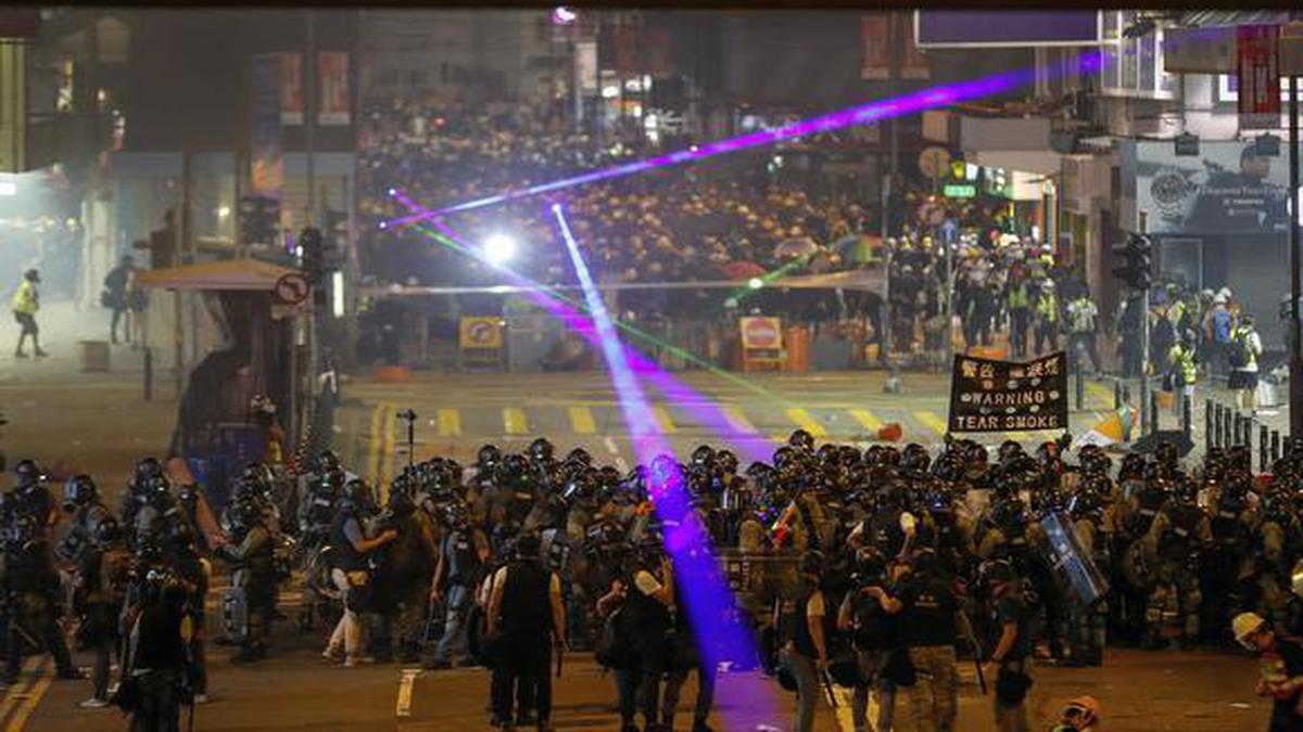 Riot police fire tear gas at Hong Kong protesters