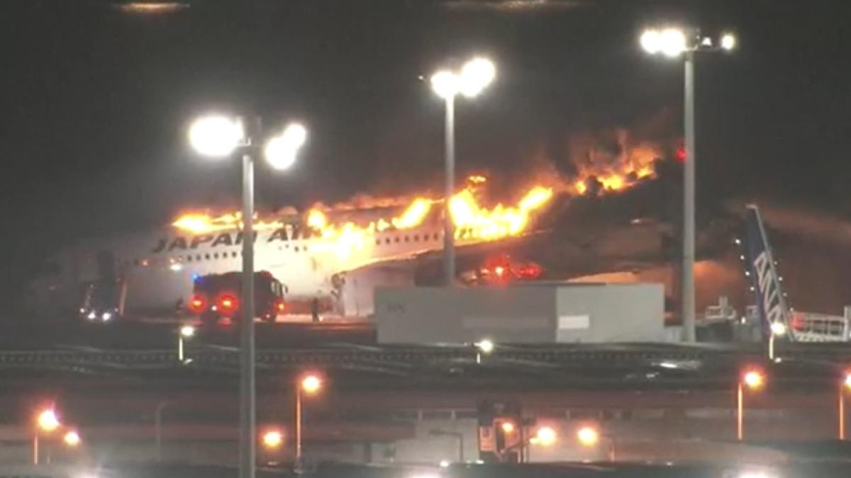 Airliner on fire on runway at Tokyo’s Haneda airport