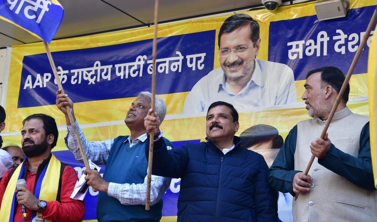 AAP leaders Sanjay Singh, Gopal Rai and others address the media after the AAP became a national party, at party headquarters in New Delhi on December 8, 2022.