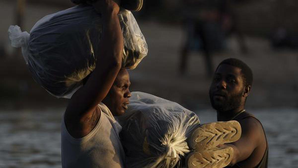 Mexico urges Haitians at U.S.-Mexico border to give up and head south