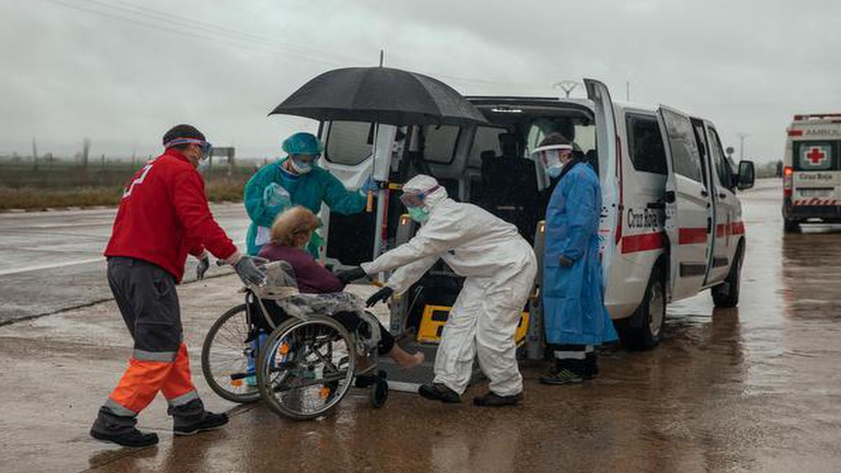 Global coronavirus cases near a million as Spain sees record deaths