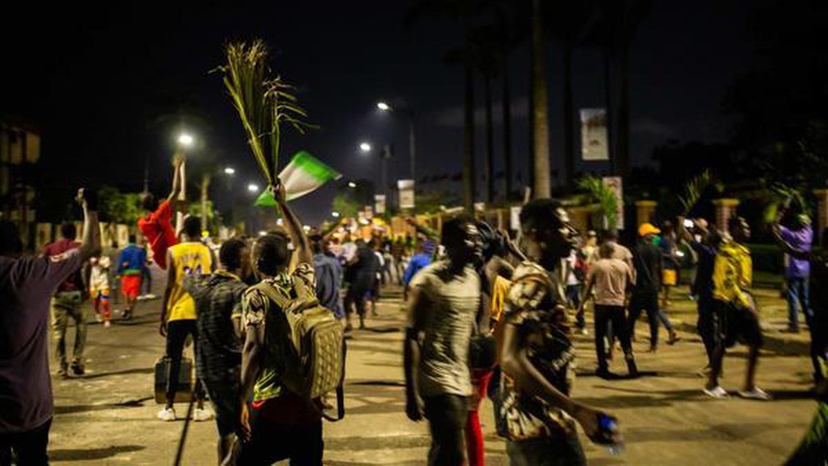 Nigeria security forces kill protesters after curfew imposed