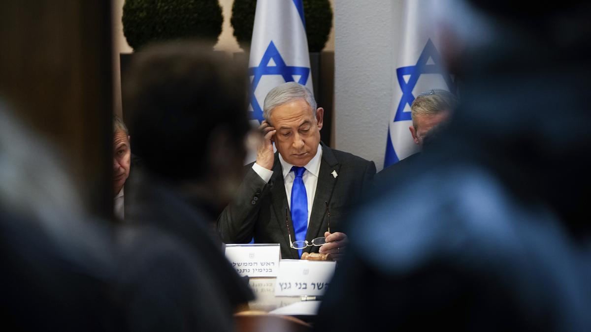 Israel PM Benjamin Netanyahu heckled by hostage families during parliament address