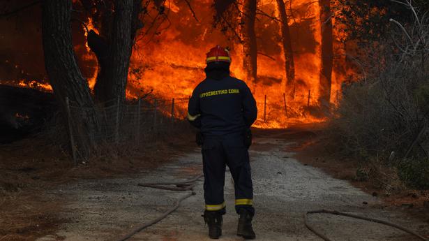 Greece battles four major wildfires; hotels, homes evacuated
