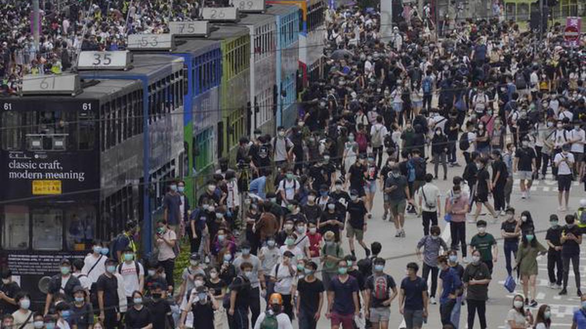 Hong Kong police fire tear gas on biggest protests since COVID-19 curbs