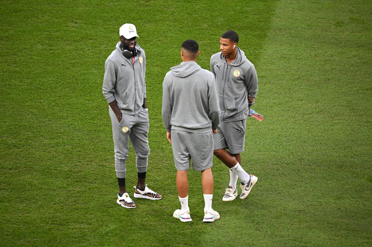 Senegal players inspect the pitch prior to the FIFA World Cup Qatar 2022 Group A match between Ecuador and Senegal at Khalifa International Stadium on November 29, 2022, in Doha, Qatar. 