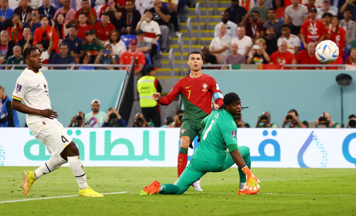 Portugal’s Cristiano Ronaldo scores a goal before play is brought back for a Ghana free kick. 