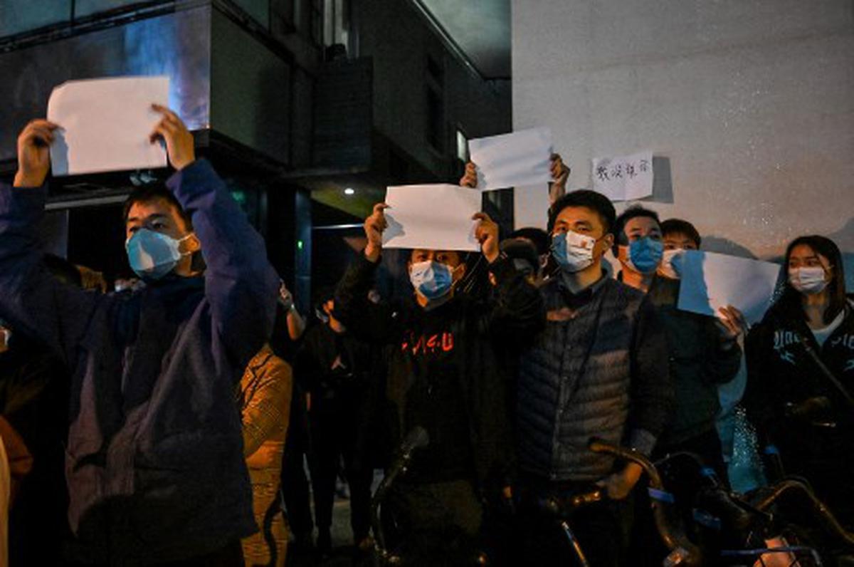 Morning Digest | China’s anti-lockdown protests spread to dozens of campuses; Germany salvages 1-1 draw with Spain, and more