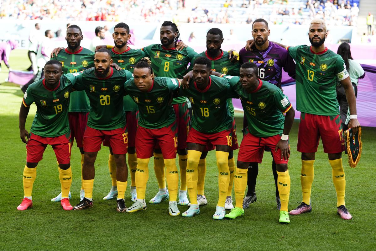 Cameroon’s players pose for a team photo prior to the World Cup group G soccer match between Cameroon and Serbia, at the Al Janoub Stadium in Al Wakrah, Qatar, Monday, Nov. 28, 2022. 