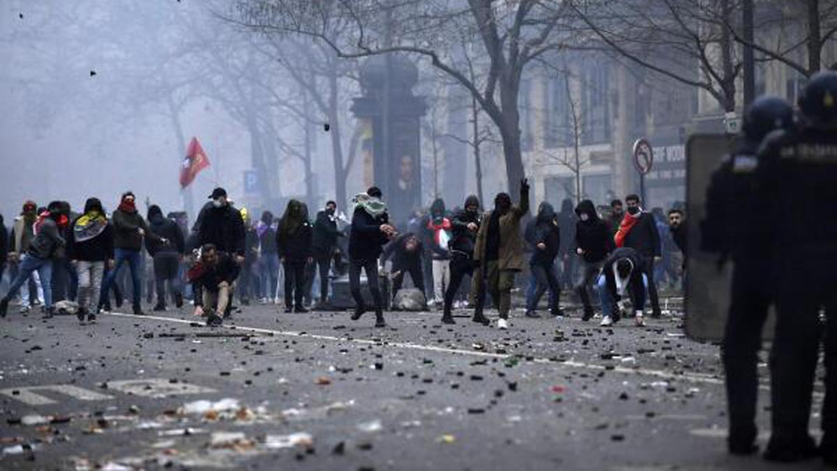 Kurds, anti-racism groups gather after deadly Paris shooting