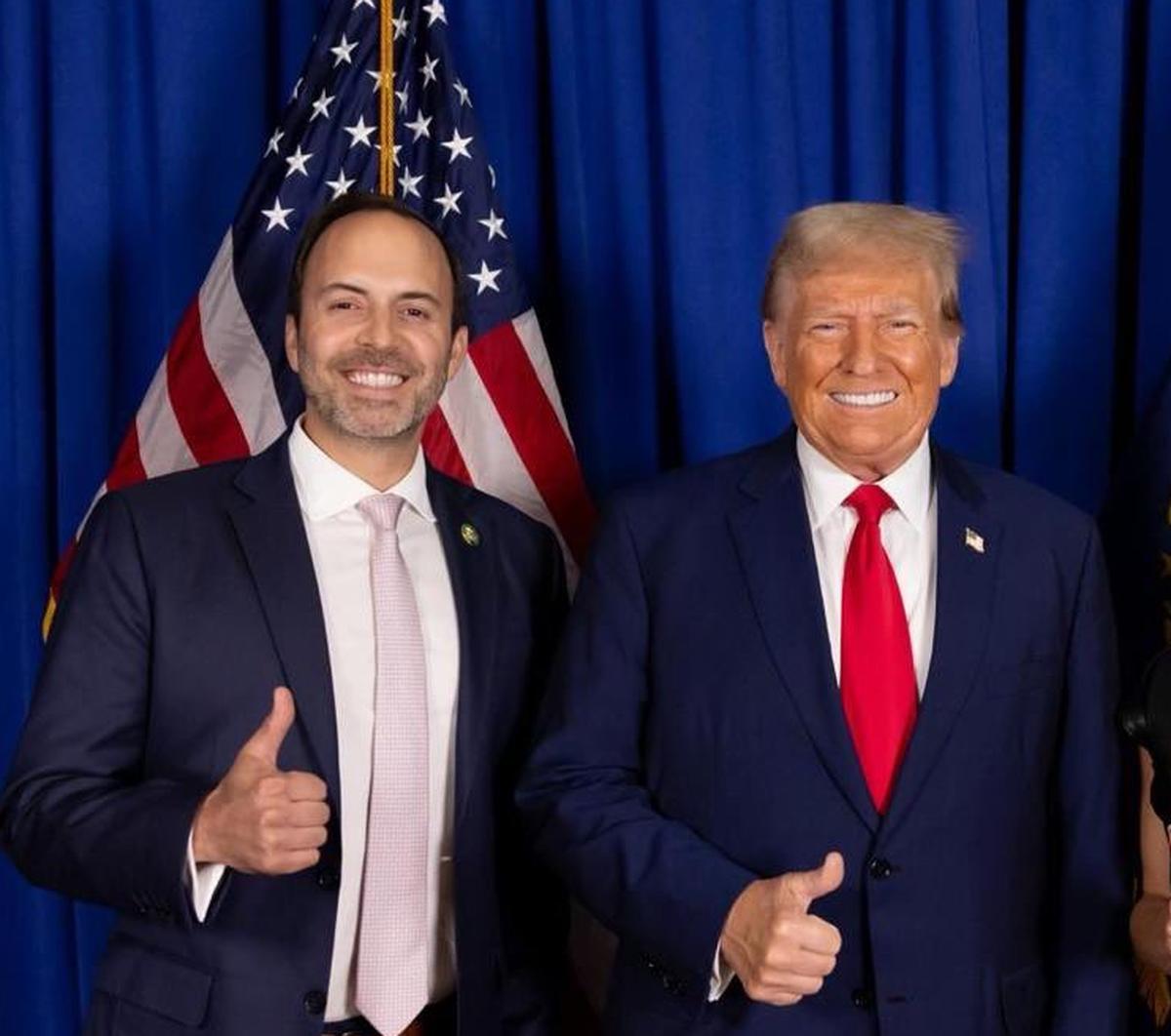 U.S. Republican Congressman Lance Gooden with U.S. President-elect Donald Trump. File