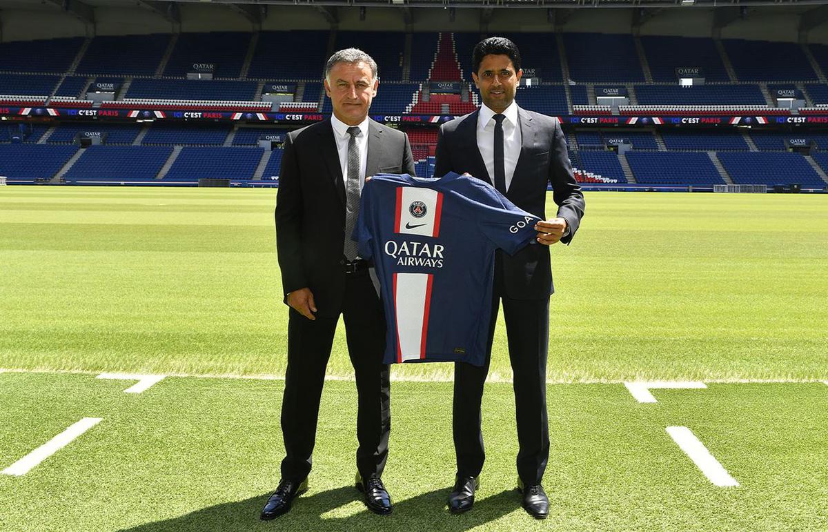 PSG’s new coach Christophe Galtier is presented a shirt by PSG chairman Nasser Al-Khelaïfi at the Parc des Princes stadium in Paris