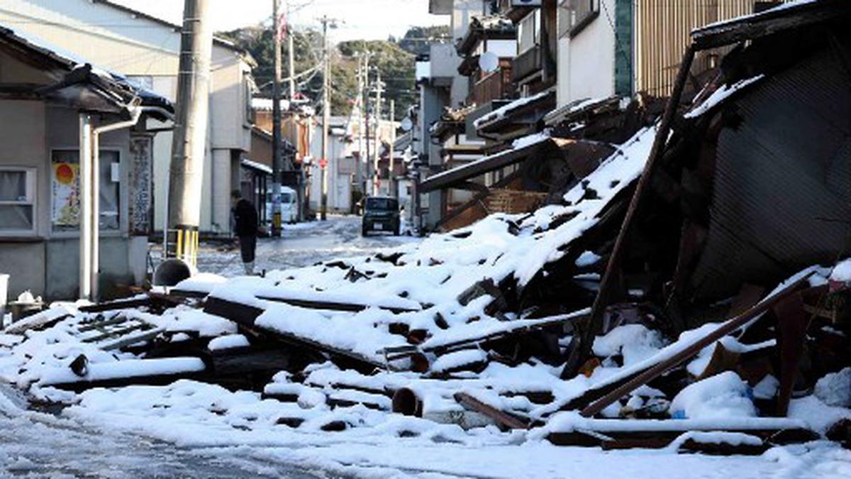 Japan sharply revises down quake missing