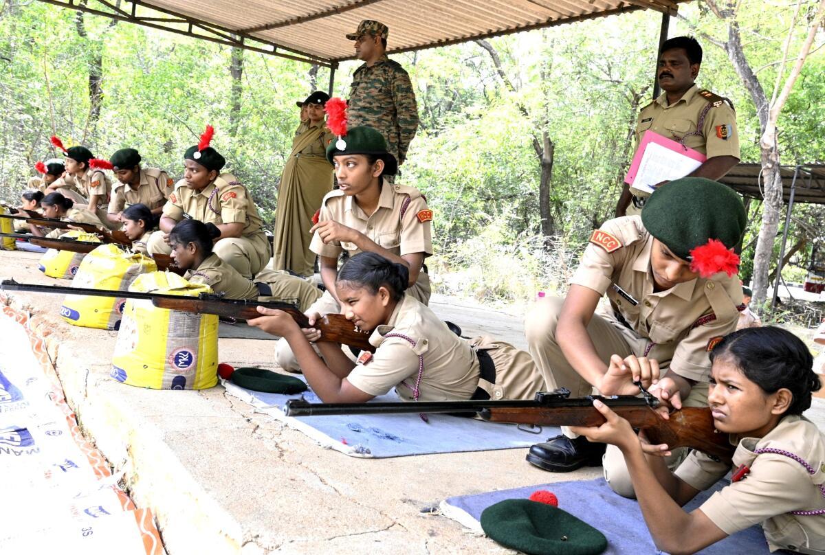 NCC cadets handle their rifles under the supervision of instructors at the Combined Annual Training Camp-1 firing range in Alipiri, Tirupati, on Friday.