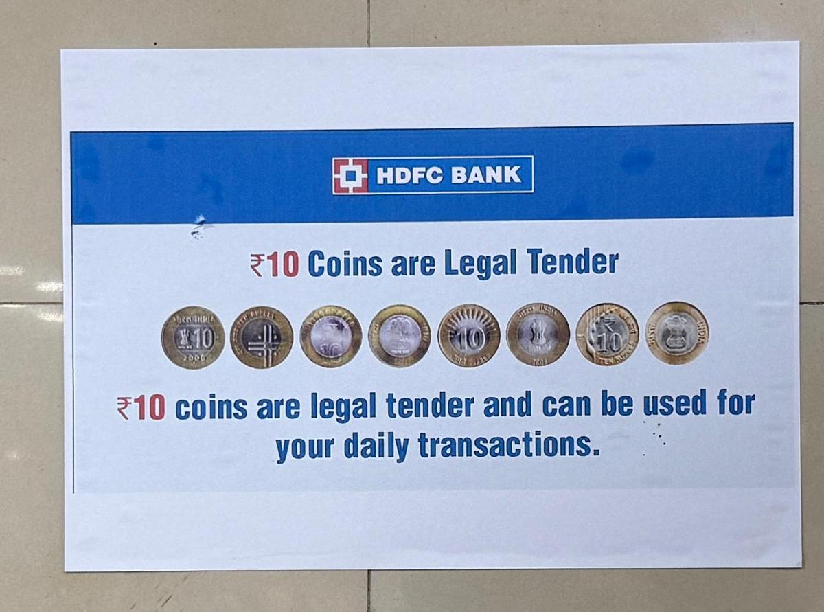 A poster from HDFC Bank shows various versions of ₹10 coins. A poster from HDFC Bank shows various versions of ₹10 coins.