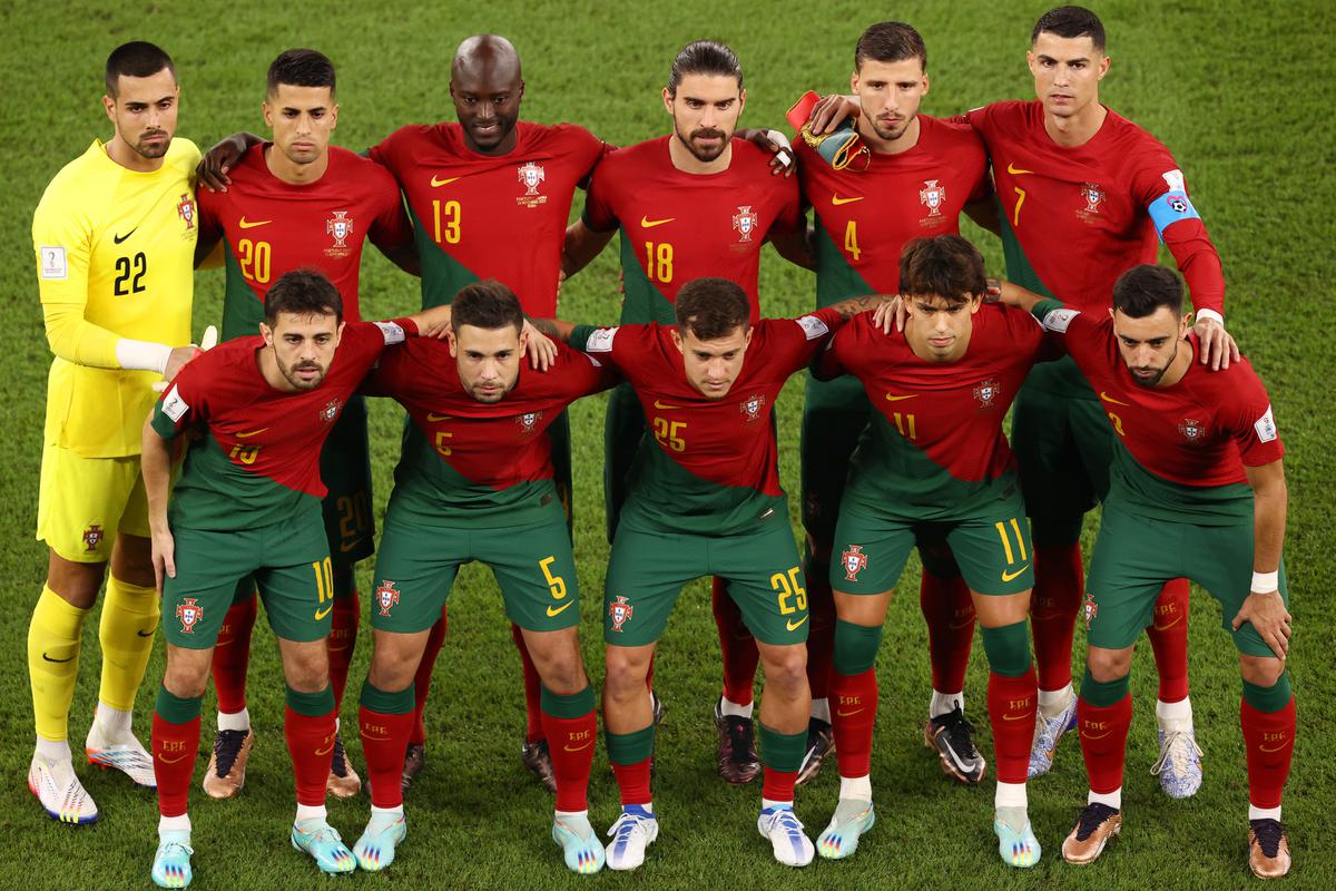 Portugal players line up for the team photos prior to the FIFA World Cup Qatar 2022 Group H match between Portugal and Ghana at Stadium 974 on November 24, 2022, in Doha, Qatar. 