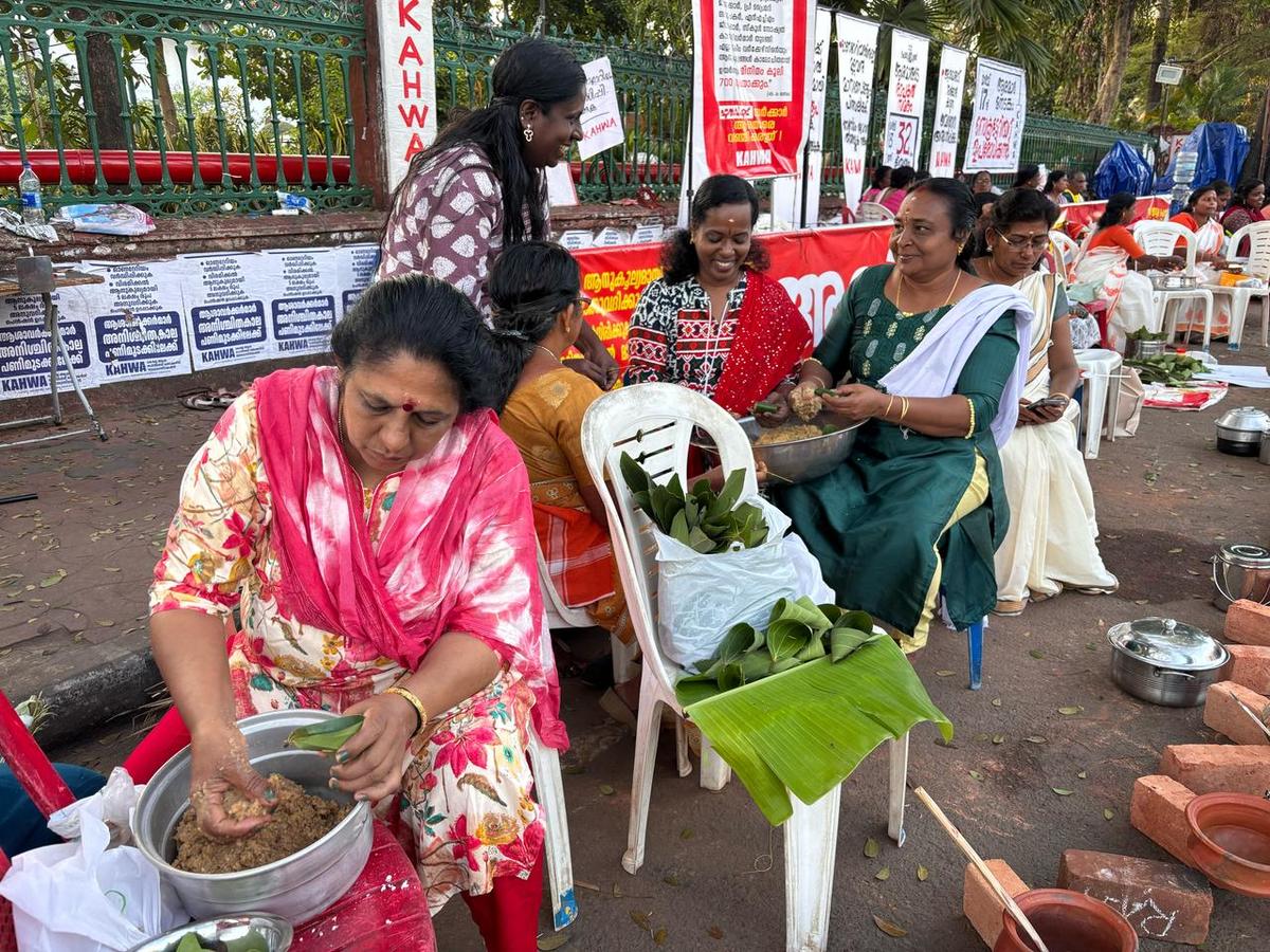 Asha workers who are protesting outside the Kerala secretariat preparing for Pongala at the protest site in Thiruvananthapuram. 