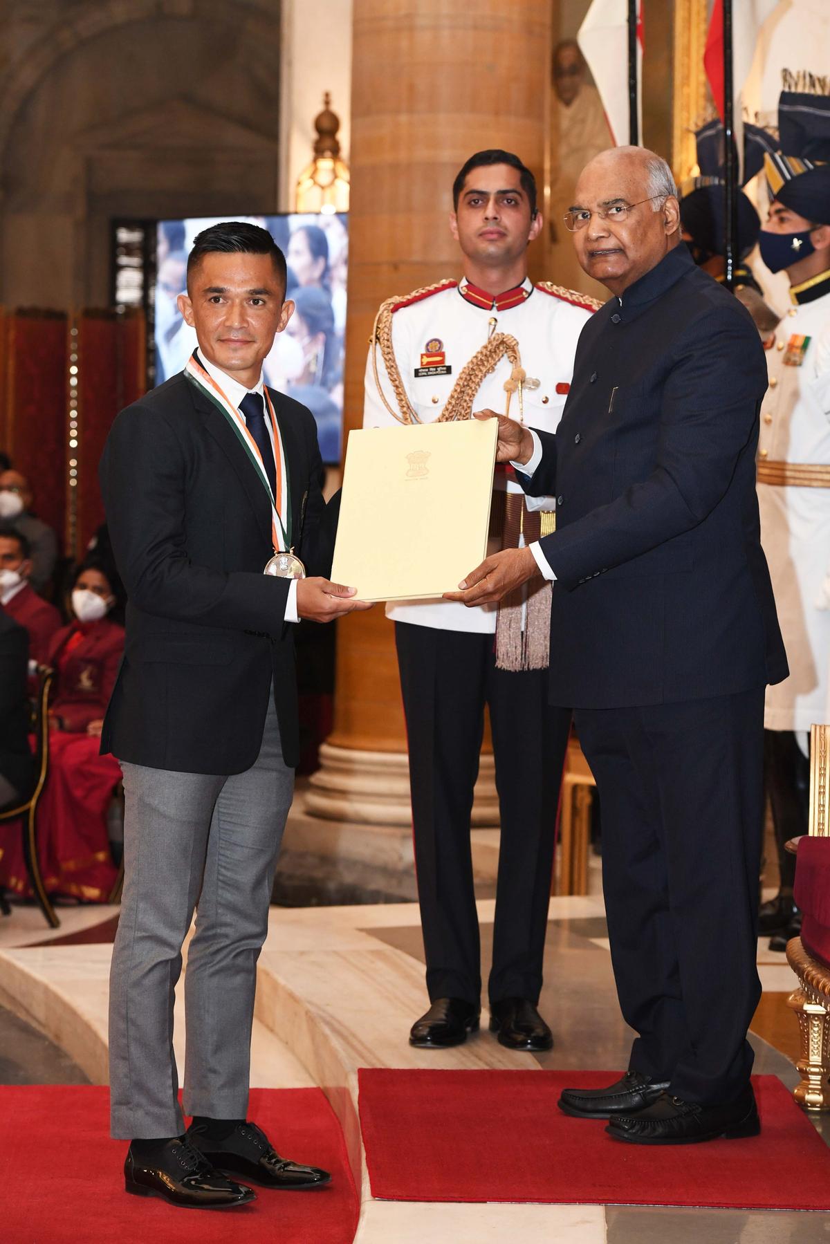 Indian footballer Sunil Chhetri receives the Major Dhyan Chand Khel Ratna award from President Ramnath Kovind on November 13, 2021, in recognition of his outstanding achievements in Football