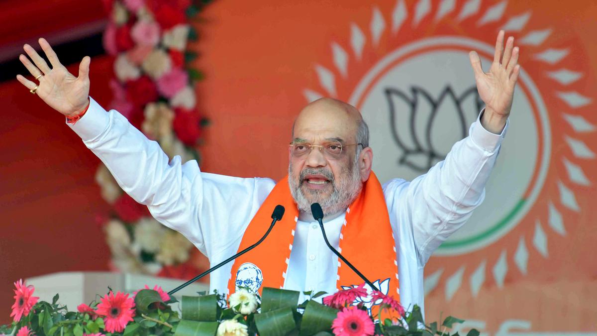 Land mafia would be punished, Amit Shah tells RJD Chief Lalu Prasad