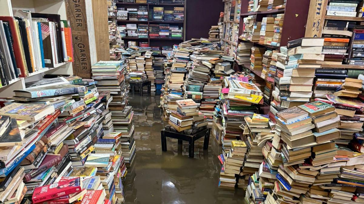 Rainwater floods Bookworm store on Church Street