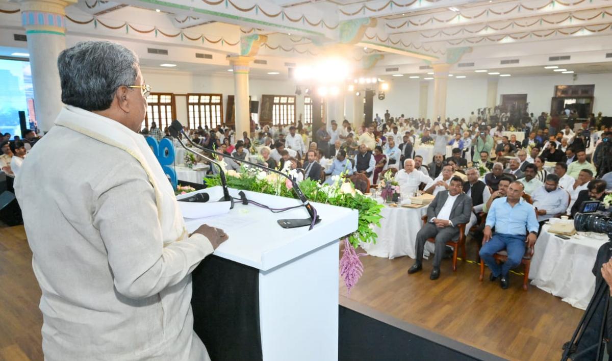 Chief Minister Siddaramaiah addressing the audience, comprising captains of diverse industries, at the launch of Karnataka’s ambitious 5,800-acre KWIN City, at Vidhana Soudha in Bengaluru on September 26, 2024.