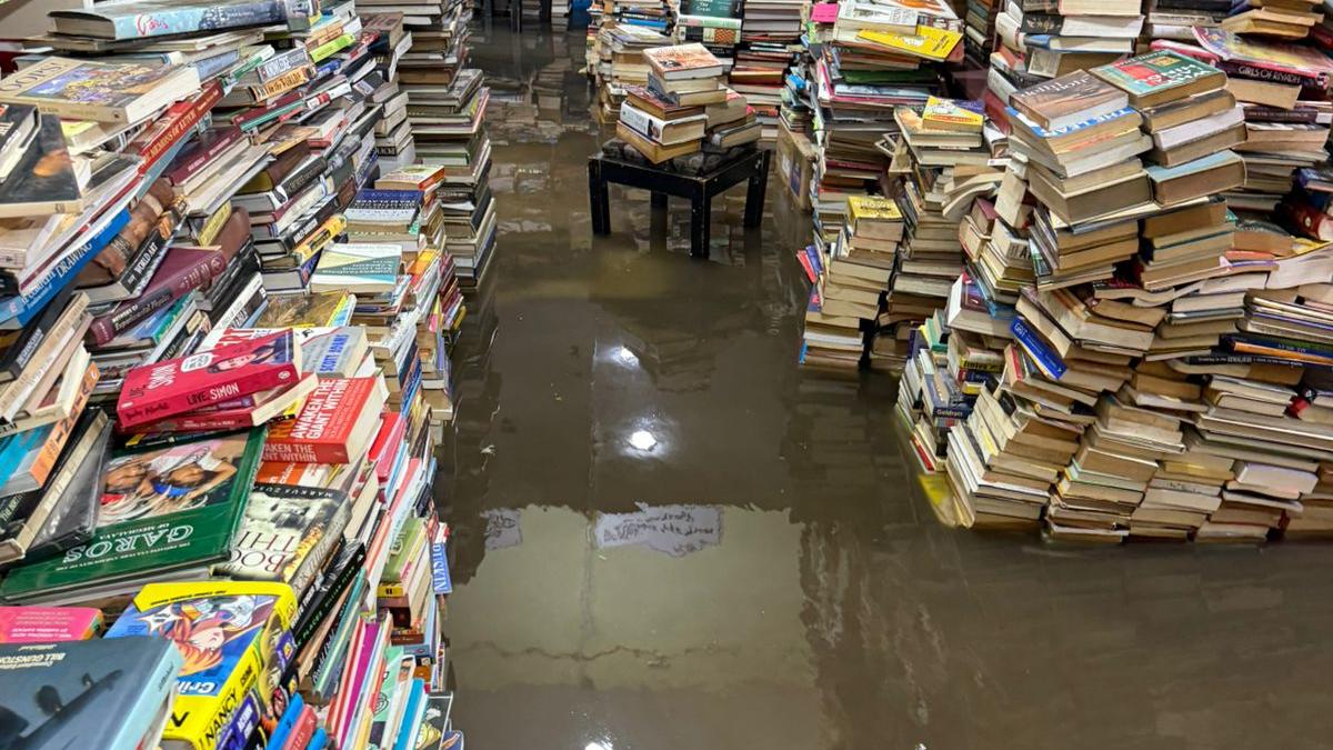 Rainwater floods Bookworm store on Church Street