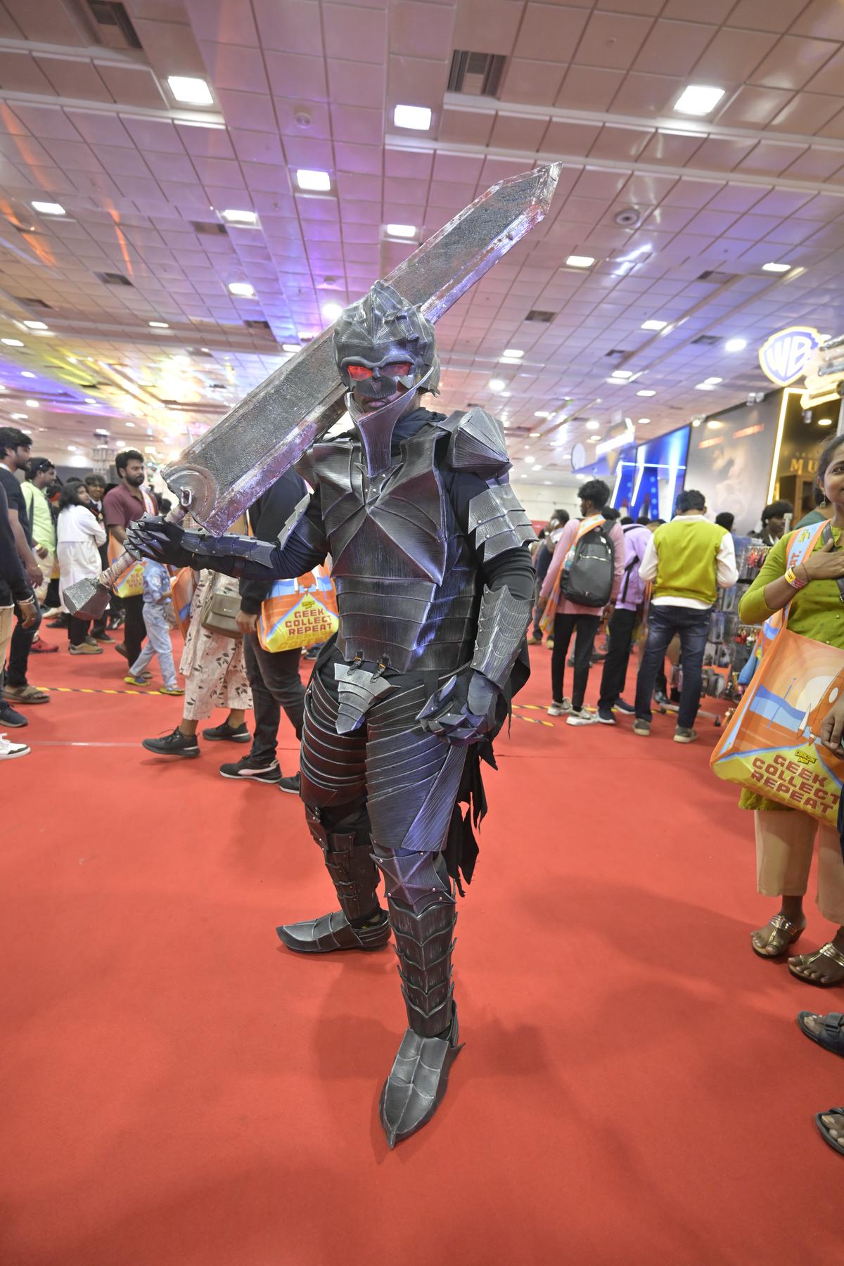 A cosplayer dressed as Guts, from the manga series Berserk 