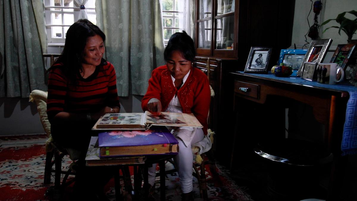 Activist  Hasina Kharbhih with Ella, a trafficking survivor, in a still from the documentary From the Shadows.
