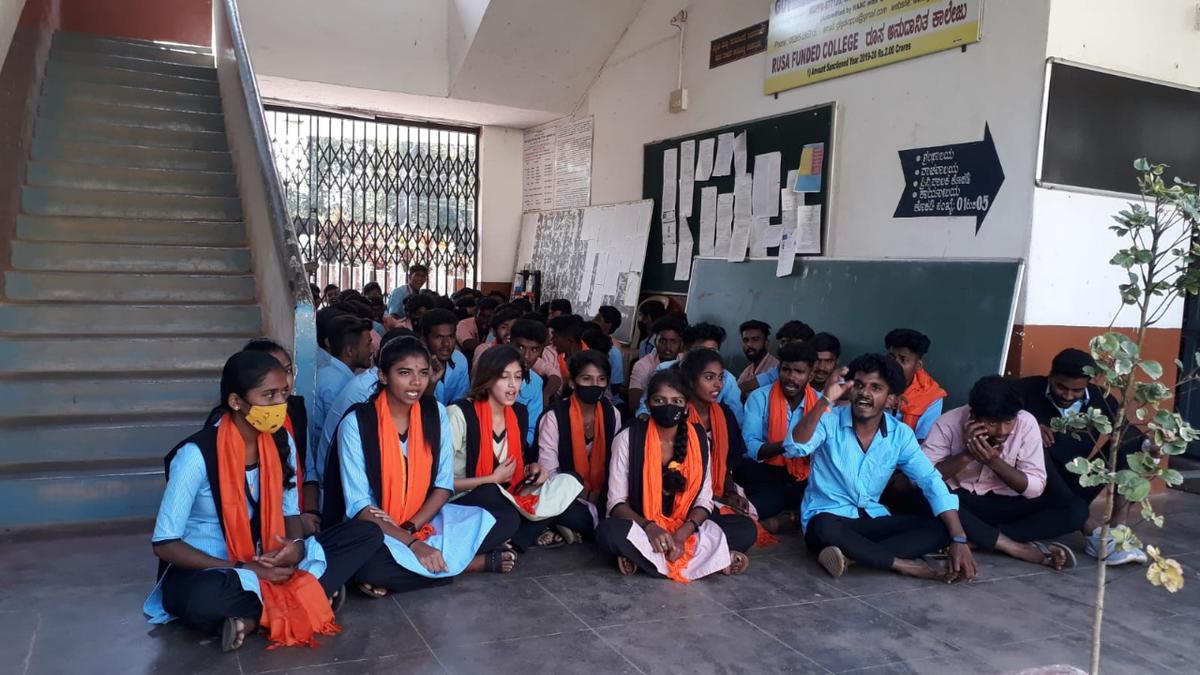 Students in Koppa stage protest demanding permission to wear saffron shawls