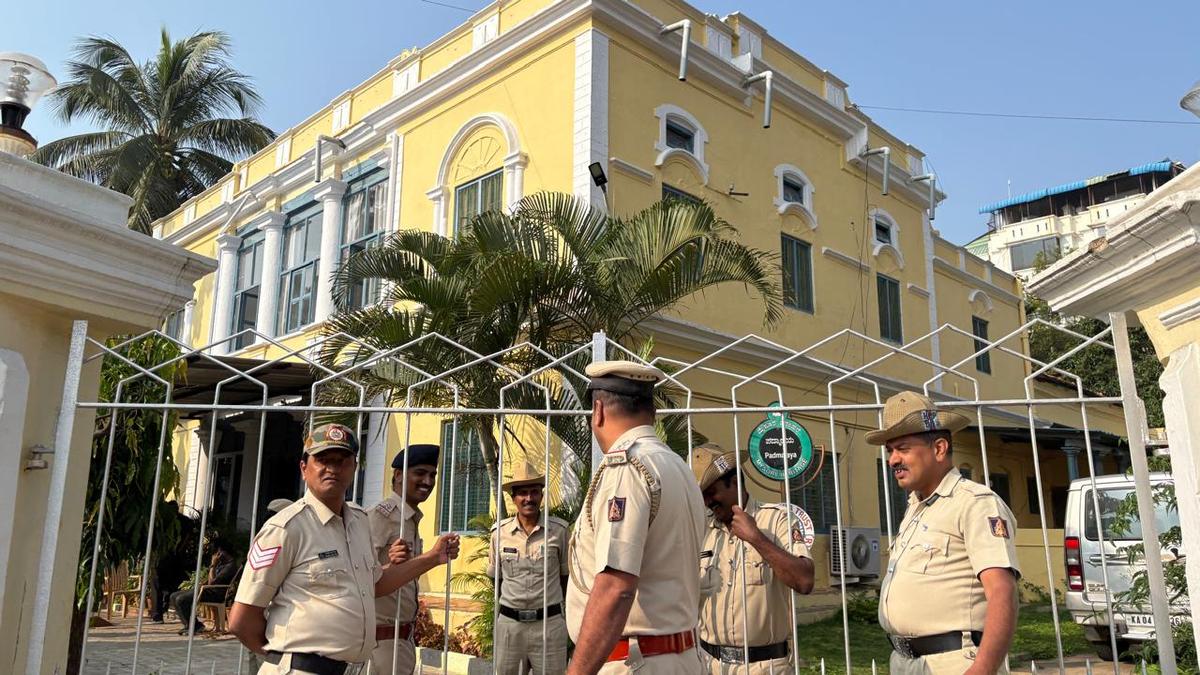 Police personnel posted around the office of Superintendent of Lokayukta police on Dewan’s Road in Mysuru on November 6, 2024. 