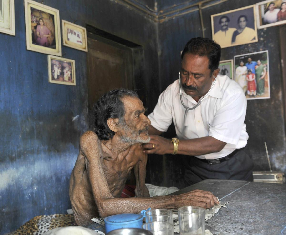 Kerala is a global leader in community-based palliative care. The photo shows a doctor evaluating a patient at his residence at Pathanamthitta. Kerala is a global leader in community-based palliative care. The photo shows a doctor evaluating a patient at his residence at Pathanamthitta.
