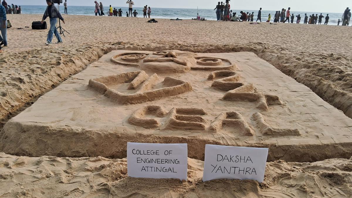 College students prepare sand art installation