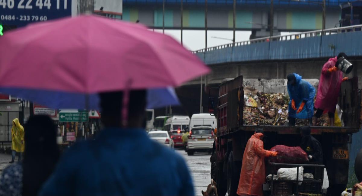 Heavy rains have lashed Kochi city and its surrounding areas since the early hours of Tuesday. The downpour has also disrupted waste evacuation, as municipal workers struggle to clean the city. Heavy rains have lashed Kochi city and its surrounding areas since the early hours of Tuesday. The downpour has also disrupted waste evacuation, as municipal workers struggle to clean the city.