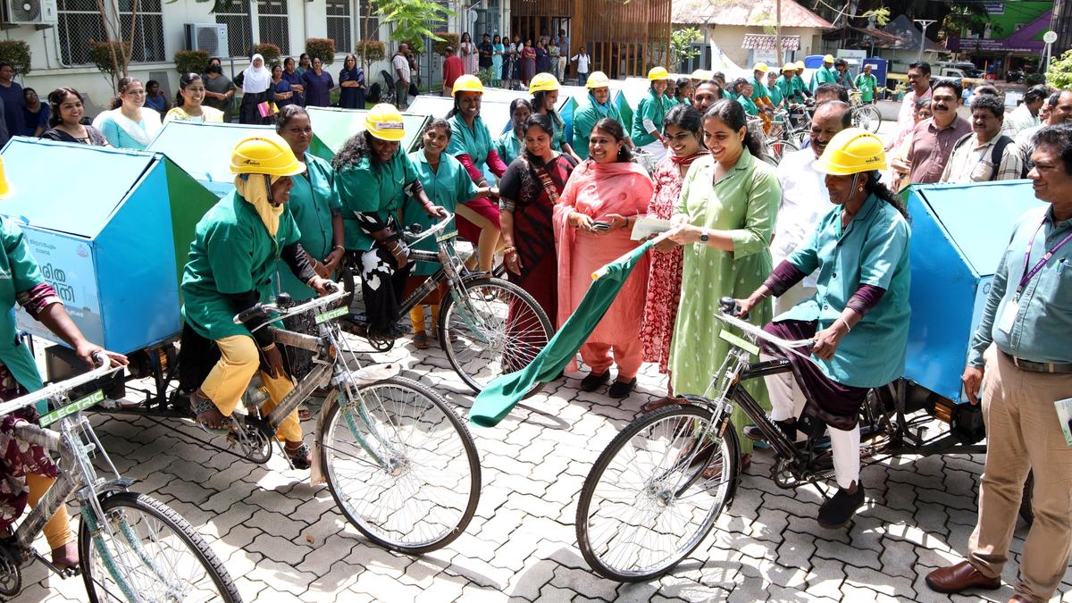 Thiruvananthapuram Corporation dstributes electric tricycles 