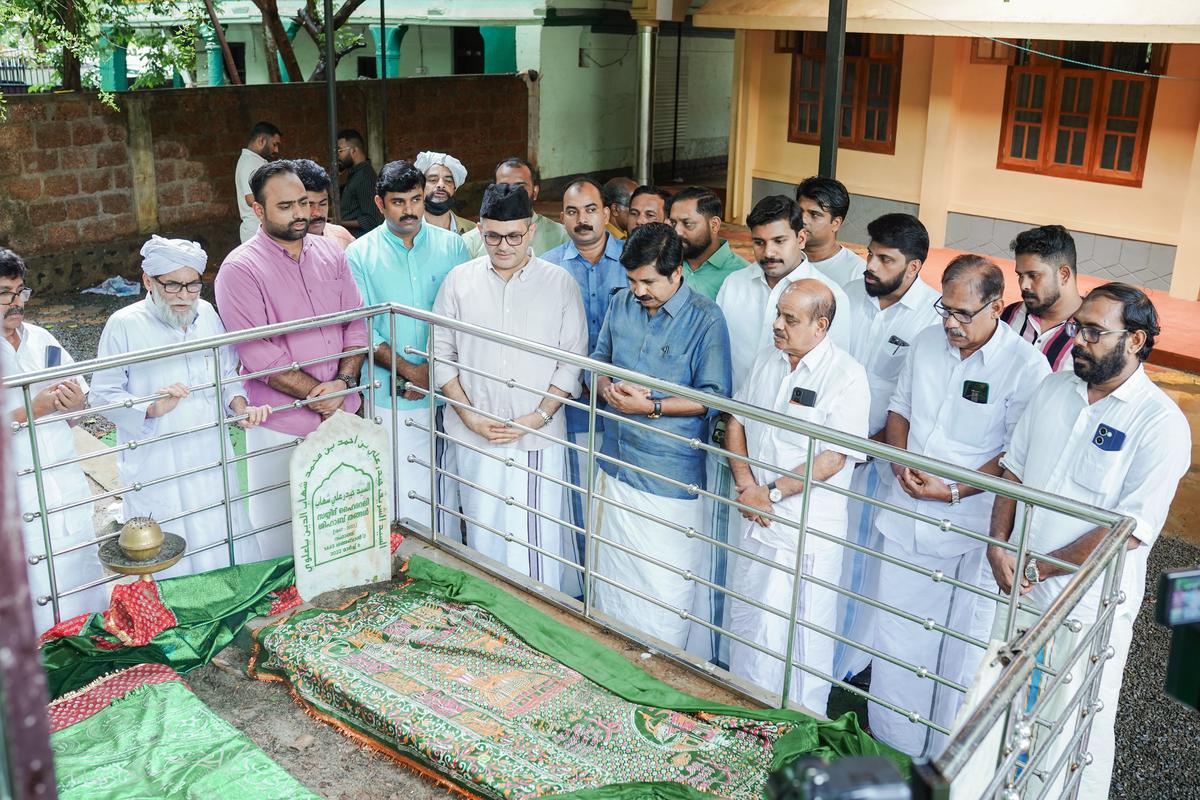 UDF candidate Aryadan Shoukath praying at the graves of Syed Mohammedali and Syed Hyderali Shihab Thangals at Panakkad on Tuesday. UDF candidate Aryadan Shoukath praying at the graves of Syed Mohammedali and Syed Hyderali Shihab Thangals at Panakkad on Tuesday.