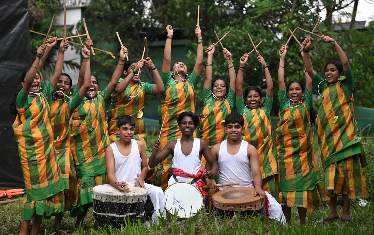GHSS, Pookkottumpadam, students celebrating after winning first prize in Malapulayattam (HS category).
