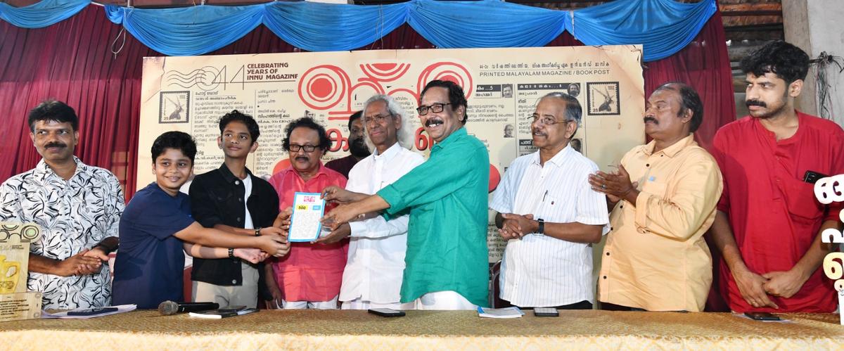 Poets Alankode Leelakrishnan and P.K. Gopi releasing the 500th issue of Innu magazine by giving a copy to Jayan Joby and Nived Nitant at Malappuram on Saturday. Poets Alankode Leelakrishnan and P.K. Gopi releasing the 500th issue of Innu magazine by giving a copy to Jayan Joby and Nived Nitant at Malappuram on Saturday.