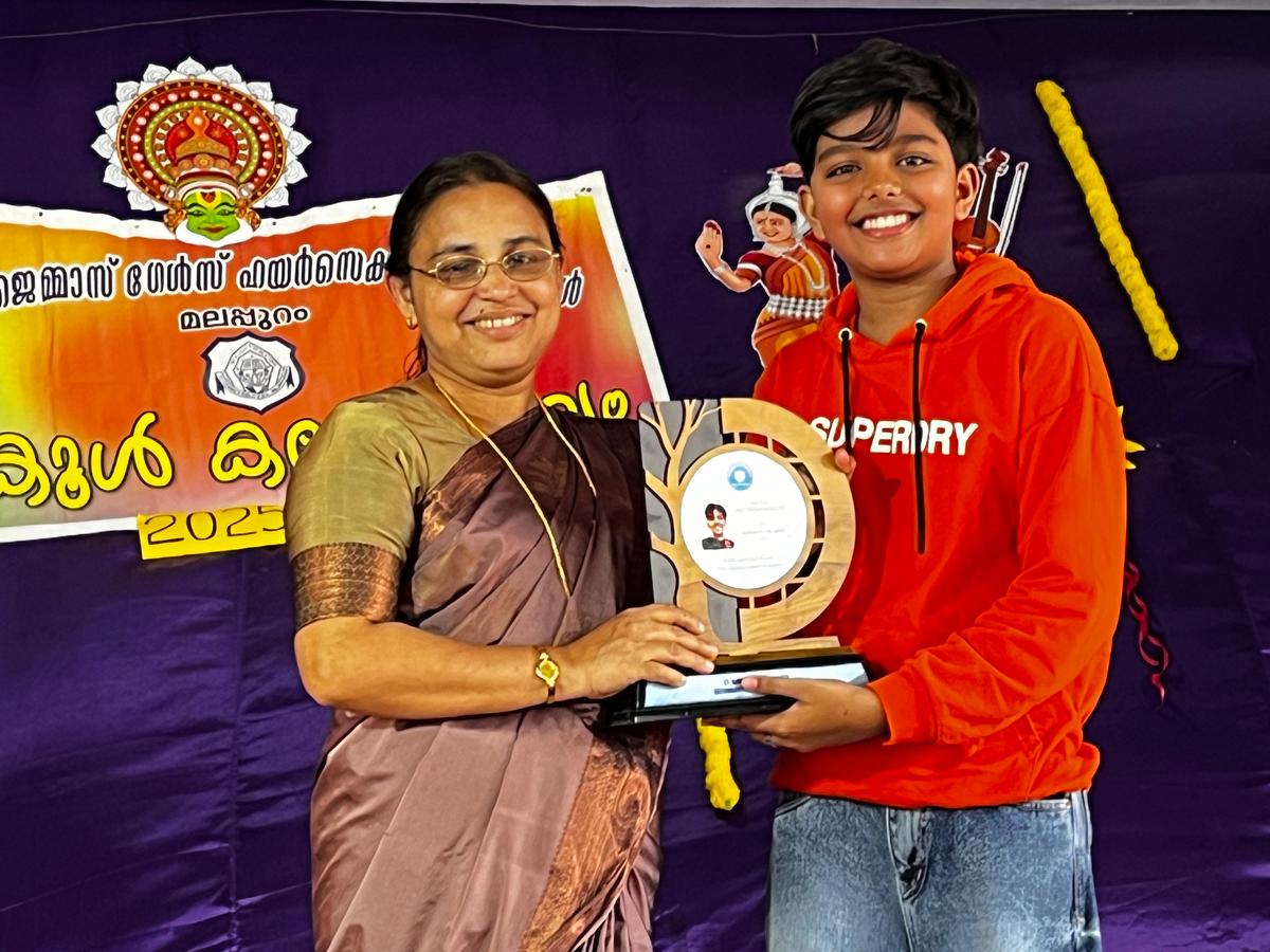 Headmistress E.A. Shijimol handing over a memento to Adwaith M. Sree after he inaugurated the school arts festival at St. Gemma’s Girls Higher Secondary School, Malappuram.