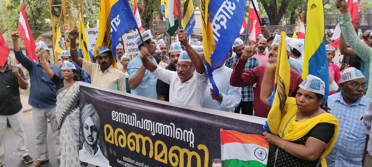 Aam Aadmi Party activists stage a protest near Raj Bhavan in Thiruvananthapuram on March 22, 2024 against the arrest of their leader Arvind Kejriwal.