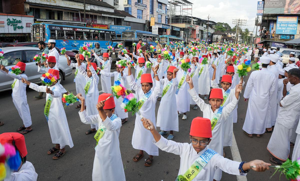 Madin Academy students presenting a flower show during a Milad rally taken out at Malappuram on Thursday. Madin Academy students presenting a flower show during a Milad rally taken out at Malappuram on Thursday.