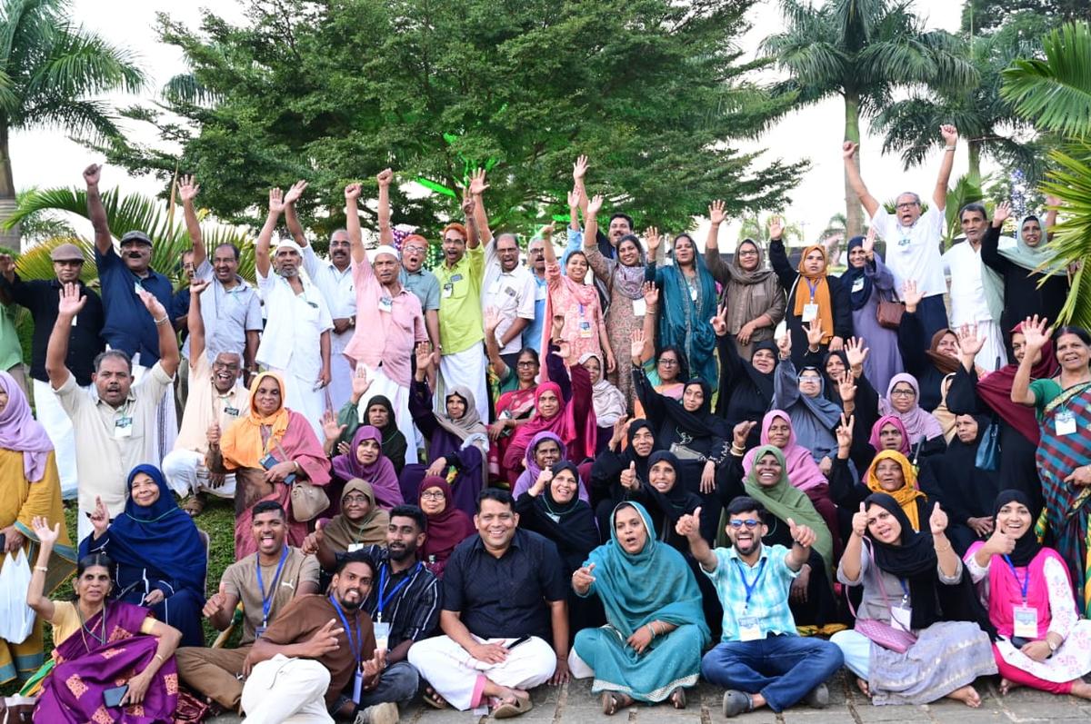 A group of participants during a photo op with Malappuram municipal officials.